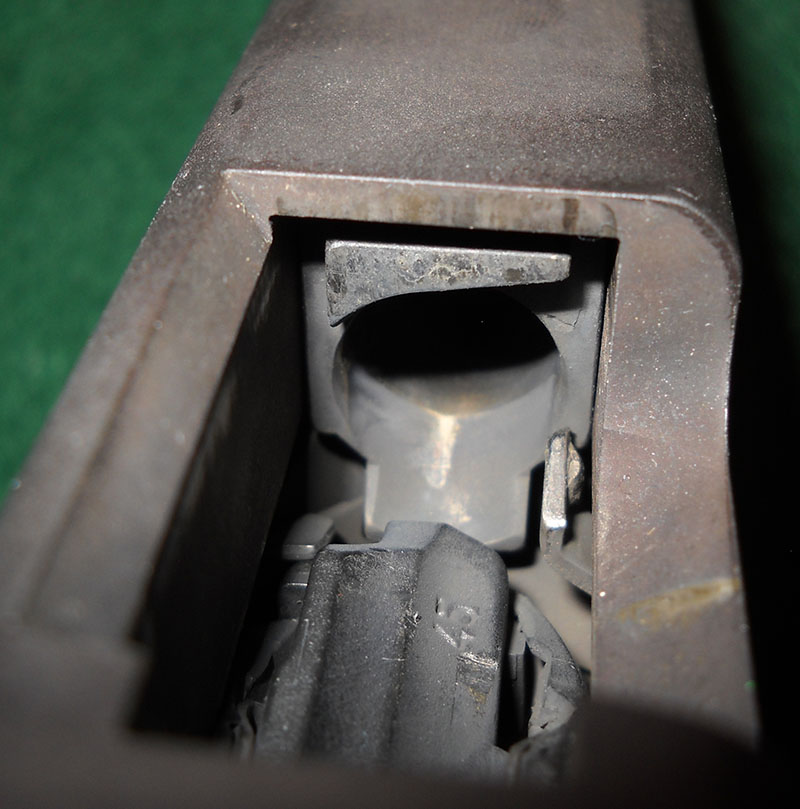 detail, Glock 21 with slide open, showing chamber mouth and feed ramp